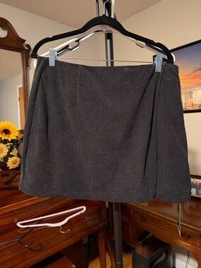 HALARA Black Corduroy A-Line Mini Skort with split in front